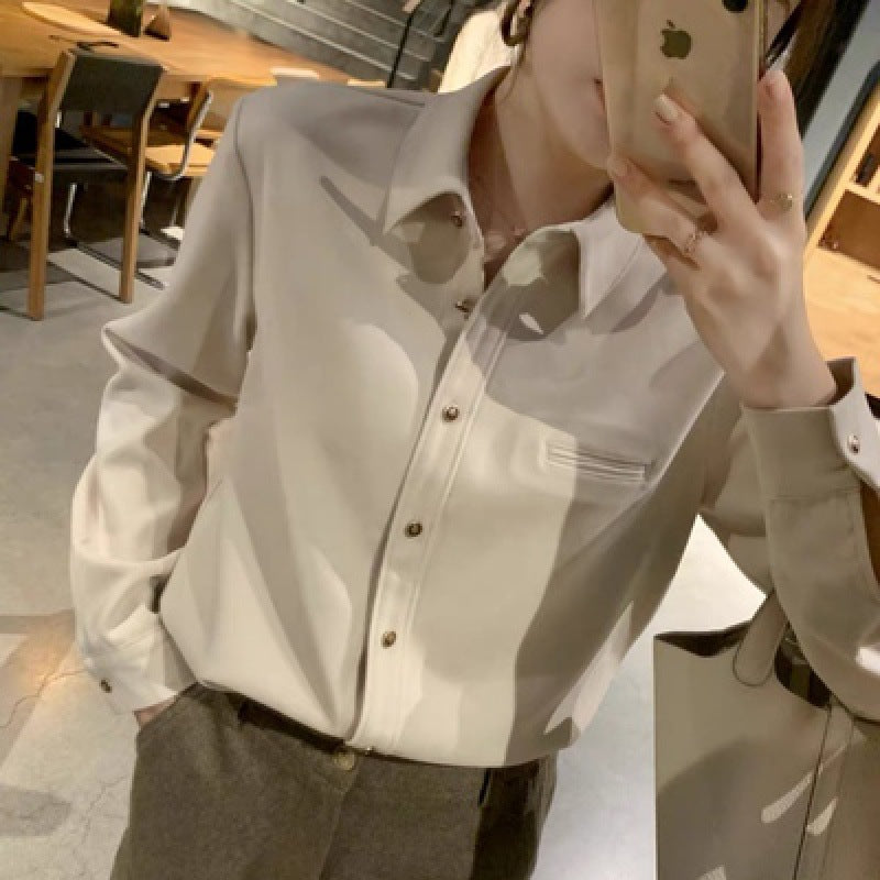 Stacked white shirt women's design sense niche Hong Kong style autumn and winter long-sleeved retro interior chic v-neck top