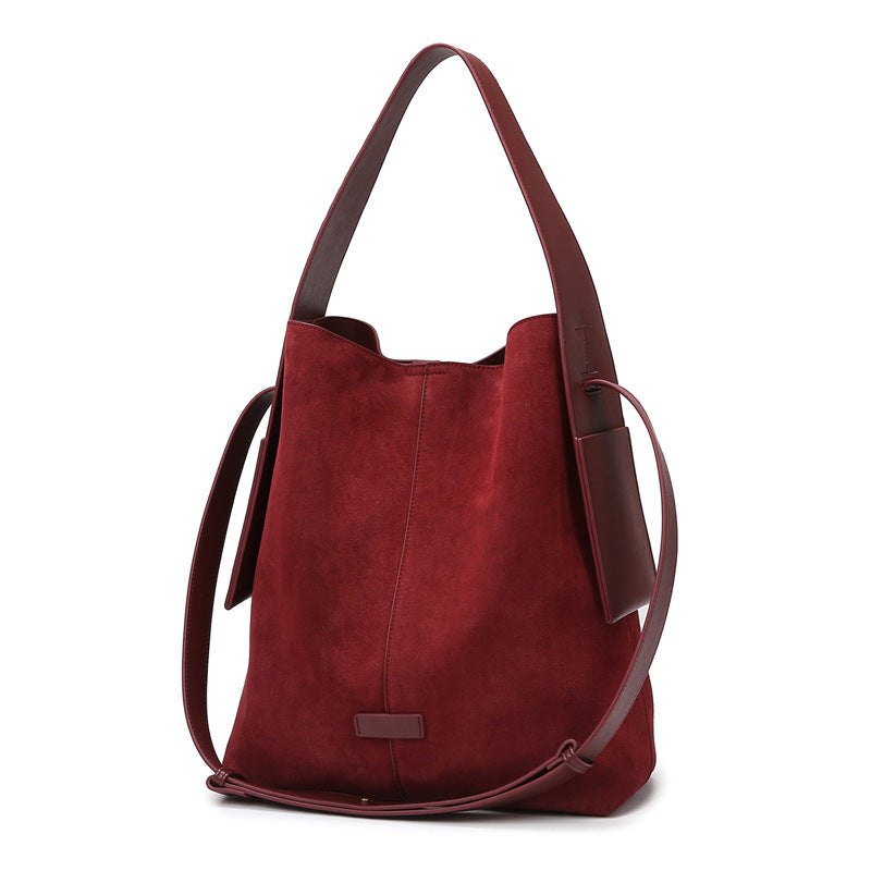 2025 Bucket bag women's spring fashion embossed shoulder bag large capacity high sense handbag work commuter bag