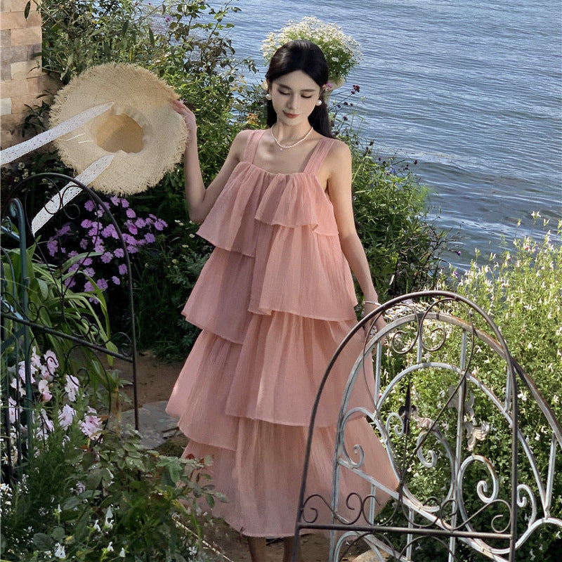 2025 Pink gentle wind suspender dress women's summer new seaside vacation sweet age reduction sleeveless ruffle leaf edge cake dress