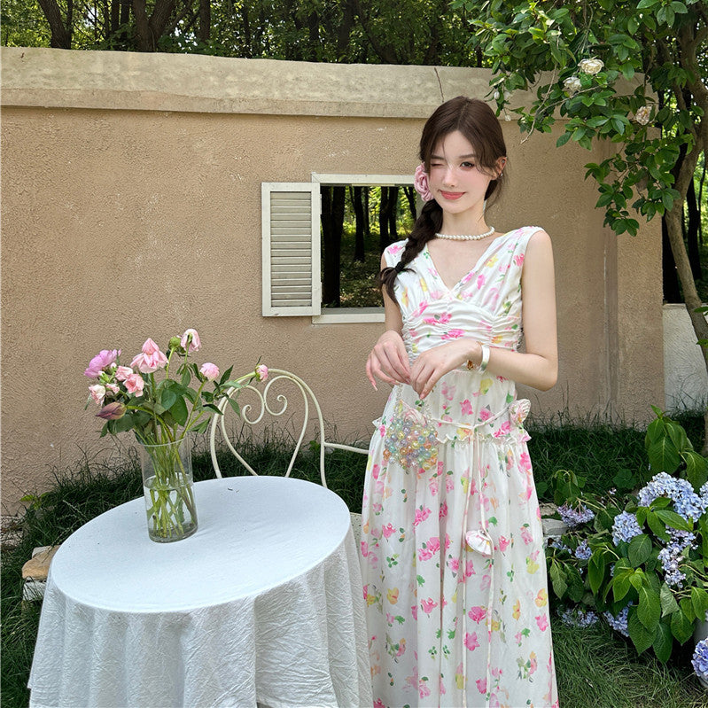 2025 pleated printing temperament V-neck dress women's summer new waist and thin retro vacation style long skirt