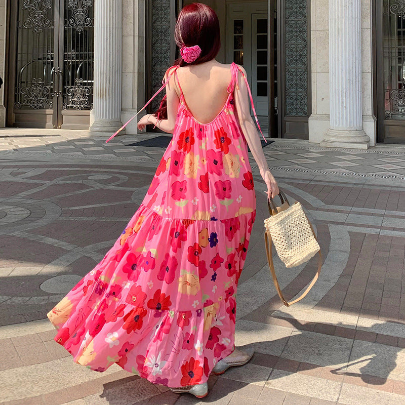 2025 Seaside vacation wind romantic pink suspender dress women's summer new printed beach loose dopamine long skirt