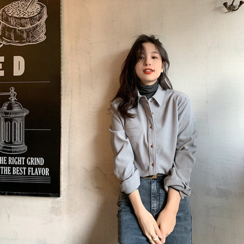 Stacked white shirt women's design sense niche Hong Kong style autumn and winter long-sleeved retro interior chic v-neck top