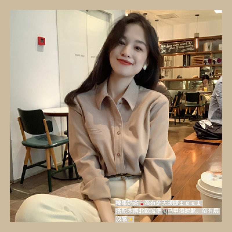 Stacked white shirt women's design sense niche Hong Kong style autumn and winter long-sleeved retro interior chic v-neck top