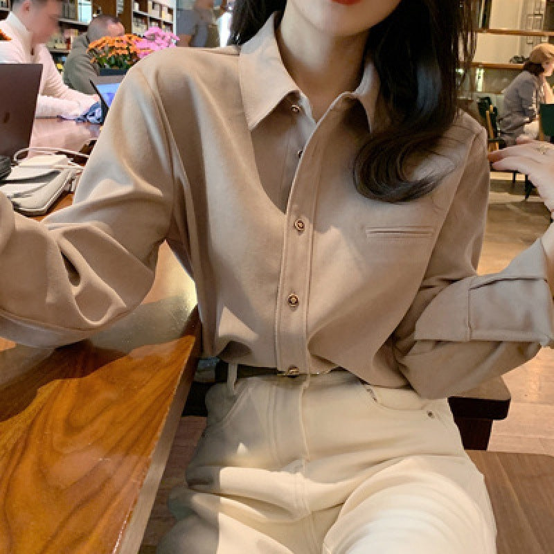 Stacked white shirt women's design sense niche Hong Kong style autumn and winter long-sleeved retro interior chic v-neck top