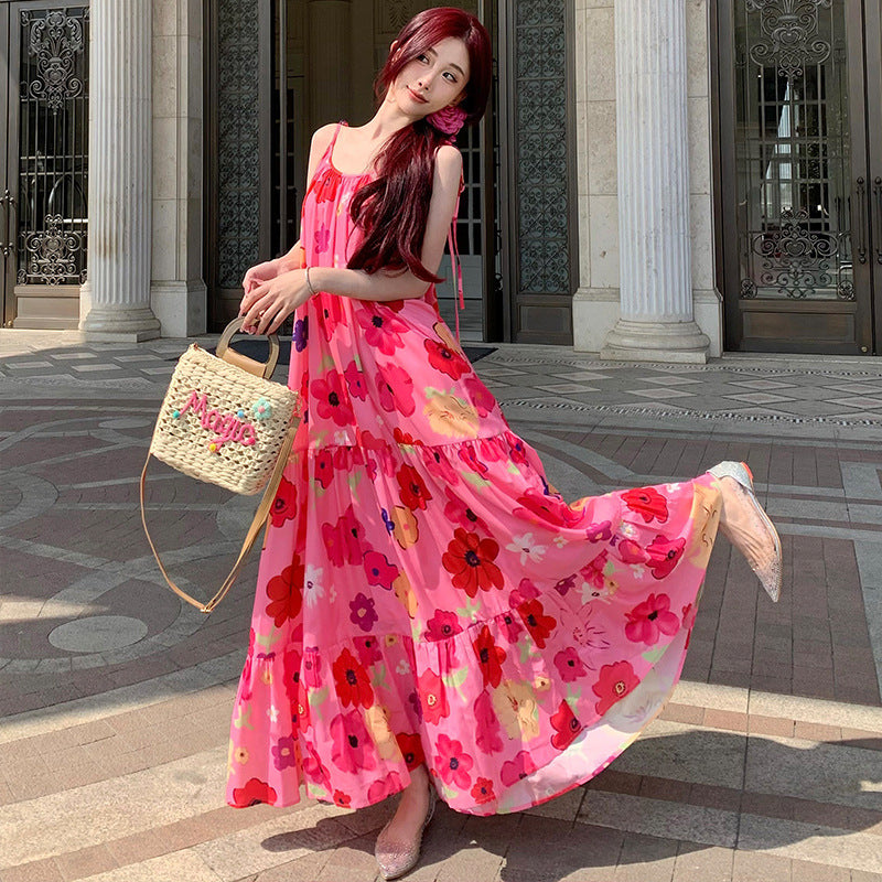 2025 Seaside vacation wind romantic pink suspender dress women's summer new printed beach loose dopamine long skirt