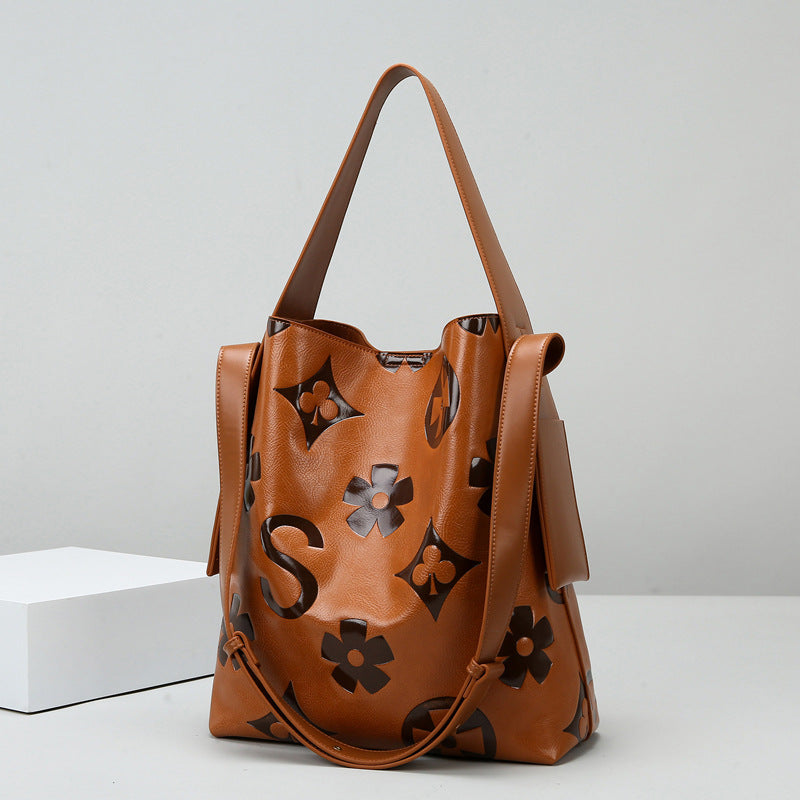 2025 Bucket bag women's spring fashion embossed shoulder bag large capacity high sense handbag work commuter bag