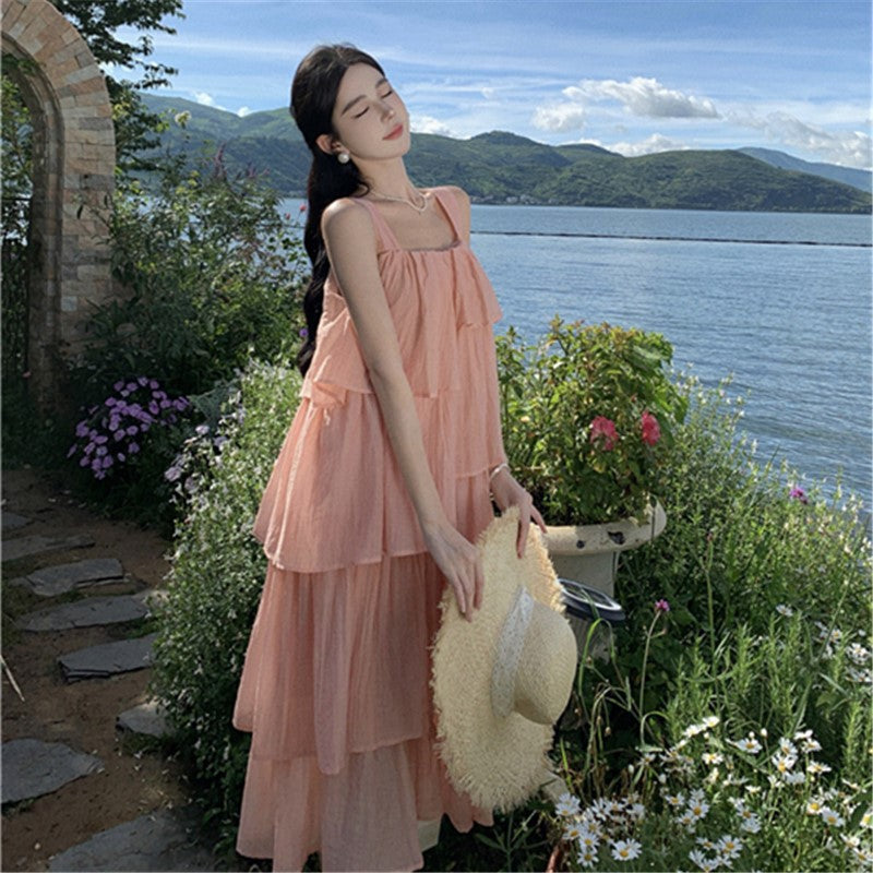 2025 Pink gentle wind suspender dress women's summer new seaside vacation sweet age reduction sleeveless ruffle leaf edge cake dress