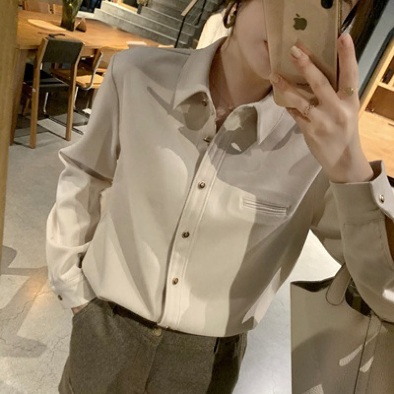 Stacked white shirt women's design sense niche Hong Kong style autumn and winter long-sleeved retro interior chic v-neck top