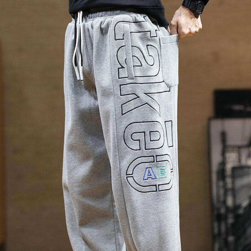 sanyamk Spring Autumn Letter Harem Pants Men casual pants Hip Hop Streetwear Black Grey Loose Sweatpants Jogger Plus Size Baggy Trouser