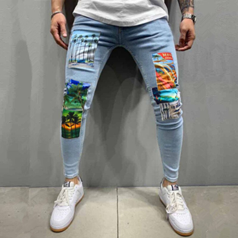 sanyamk New Fashion Mens Jeans Stretch Skinny Patchwork Cartoons Printed Black Jean Men Streetwear Denim Punk Pants Vaqueros Hombre