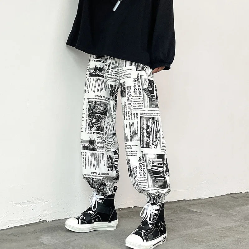 sanyamk Newspaper Pants Men Fashion High Street Spring Autumn Ankle Banded Loose Drawstring American Style Male Hip-hop Trousers Chic