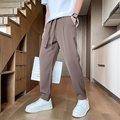 sanyamk New Slim Fitting Thin Casual Suit Pants Men Loose Korean Fashion Large Drawstring Western Pants Summer Solid Color Trousers